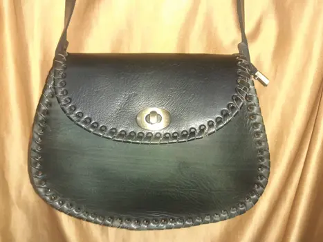 Bolso redondo vacuno asa click