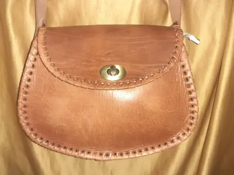 Bolso redondo vacuno asa click