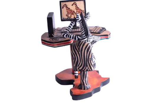 Wooden Zebra Sitting at Computer