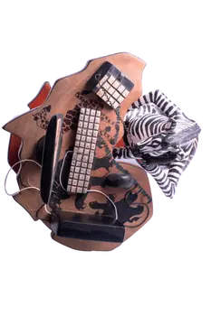 Wooden Zebra Sitting at Computer
