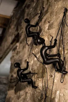 Set of Three Black Resin Climbing Man Hanging Dimensional Sculpture