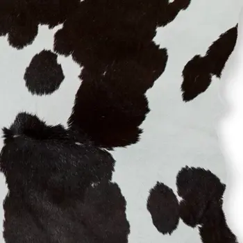 2' X 3' Brown And White Cowhide Abstract Hand Woven Area Rug