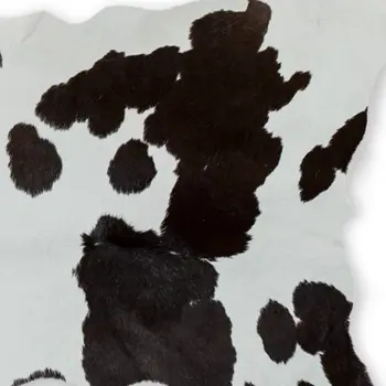 2' X 3' Brown And White Cowhide Abstract Hand Woven Area Rug