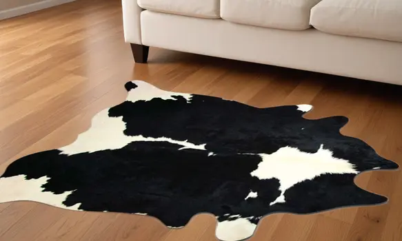 5' X 7' Black And White Cowhide Area Rug