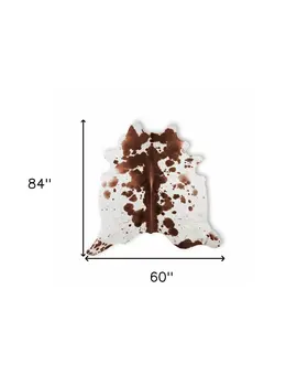 5' X 7' Brown And White Cowhide Cowhide Print Area Rug
