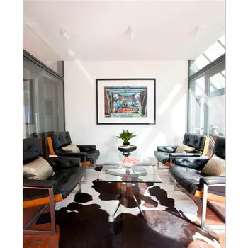5' X 7' Brown And White Cowhide Cowhide Print Area Rug