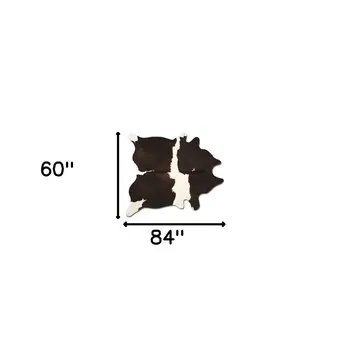 5' X 7' Brown And White Cowhide Cowhide Print Area Rug