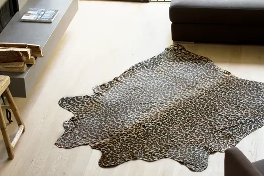 5' X 7' Brown And Black Cowhide Area Rug