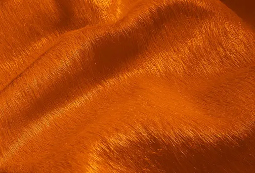 5' X 7' Orange Cowhide Area Rug
