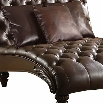 52" Brown Faux Leather Tufted Lounge Chair And Toss Pillows