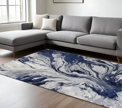 7' X 10' Blue Gray And Ivory Abstract Area Rug