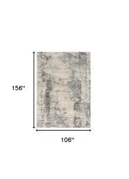 9' X 13' Ivory And Blue Abstract Area Rug