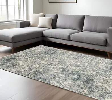 8' X 11' Ivory And Blue Damask Area Rug