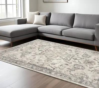 9' X 13' Ivory And Gray Floral Distressed Area Rug