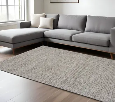 7' X 9'  Wool Natural Area Rug