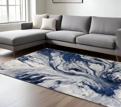 9' X 13' Blue Gray And Ivory Abstract Area Rug