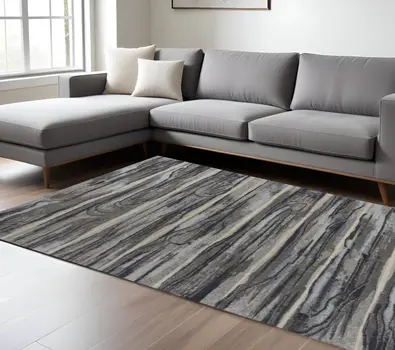 10' X 13' Gray Blue And Black Abstract Area Rug