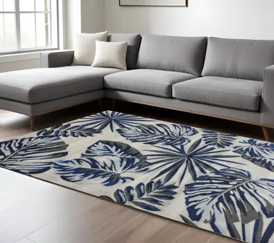 10' X 13' Gray And Blue Tropical Floral Area Rug