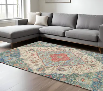 5' X 7' Blue and Beige Medallion Hand Woven Distressed Area Rug