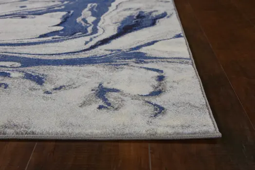 5' X 8' Blue And White Abstract Area Rug