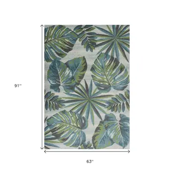 5' X 8' Beige Teal and Green Tropical Botanical Leaves Area Rug