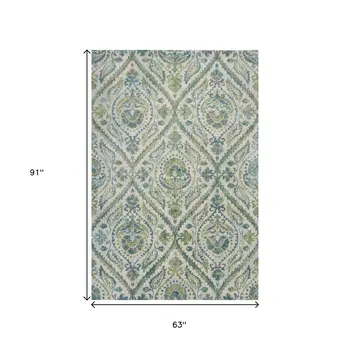 5' X 8' Ivory And Teal Tropical Floral Area Rug