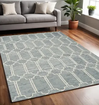 5' X 7' Blue And Ivory Wool Abstract Hand Tufted Area Rug