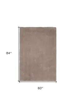 5' X 7' Beige Shag Hand Woven Area Rug