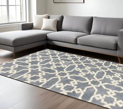 5' X 8' Slate Blue And Ivory Geometric Area Rug