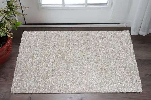 2' X 4' Ivory Shag Hand Woven Area Rug