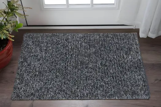2' X 4' Black And White Shag Hand Woven Area Rug