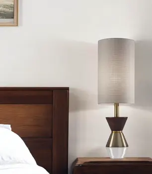 23" Brass Metal And Wood Table Lamp With Beige Drum Shade