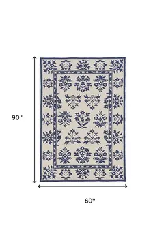 5' X 7' Sand Or Blue Floral Bordered Indoor Outdoor Area Rug