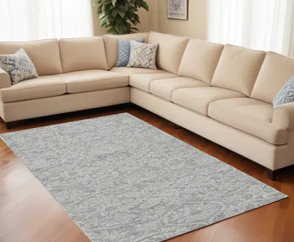7' X 10' Gray and Light Gray Wool Floral Hand Tufted Area Rug