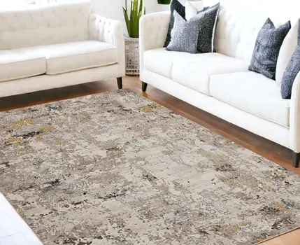 5' X 7' Gray Black And Gold Abstract Hand Loomed Distressed Area Rug