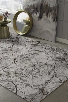 5' X 8' Ivory And Gray Abstract Area Rug