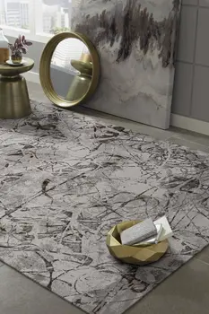 5' X 8' Ivory And Gray Abstract Area Rug