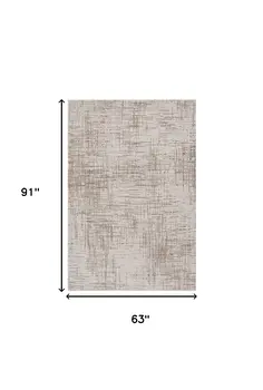 5' X 8' Beige And Tan Abstract Distressed Area Rug