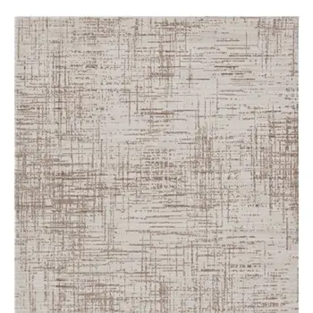 5' X 8' Beige And Tan Abstract Distressed Area Rug