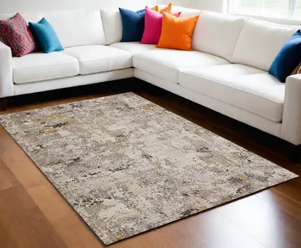 8' X 11' Beige Tan And Gold Abstract Area Rug