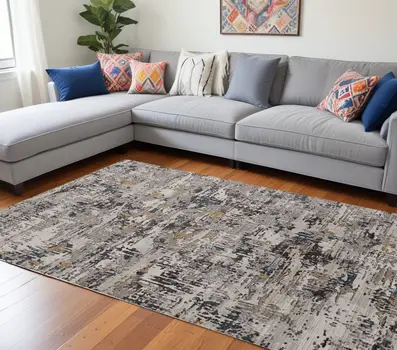 8' X 11' Gray Black And Gold Abstract Distressed Area Rug