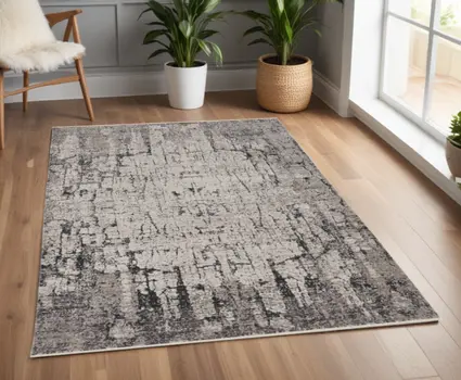 4' X 6' Ivory And Gray Abstract Distressed Area Rug