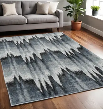 5' X 8' Blue And Ivory Geometric Area Rug