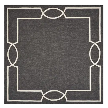 7' X 10' Onyx And White Geometric Handmade Indoor Outdoor Area Rug
