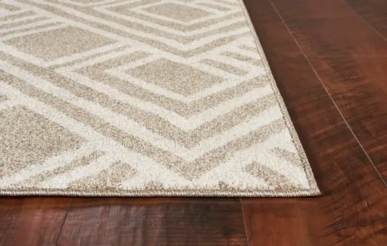 7' X 10' Beige and Ivory Geometric Indoor Outdoor Area Rug