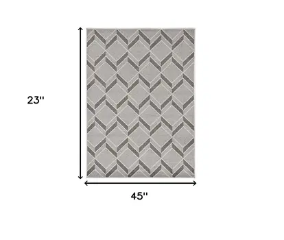 2' X 4' Green And Ivory Geometric Indoor Outdoor Area Rug