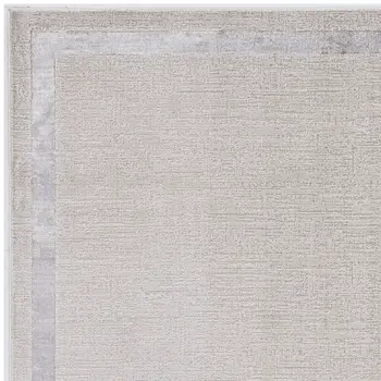 7' X 10' Ivory And Silver Area Rug