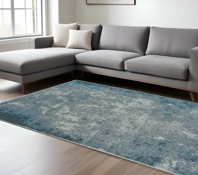 7' X 10' Blue And Silver Abstract Area Rug