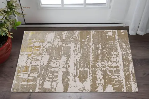 3' X 5' Gold And Ivory Abstract Area Rug