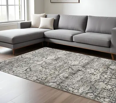 9' X 13' Gray And Ivory Floral Medallion Area Rug